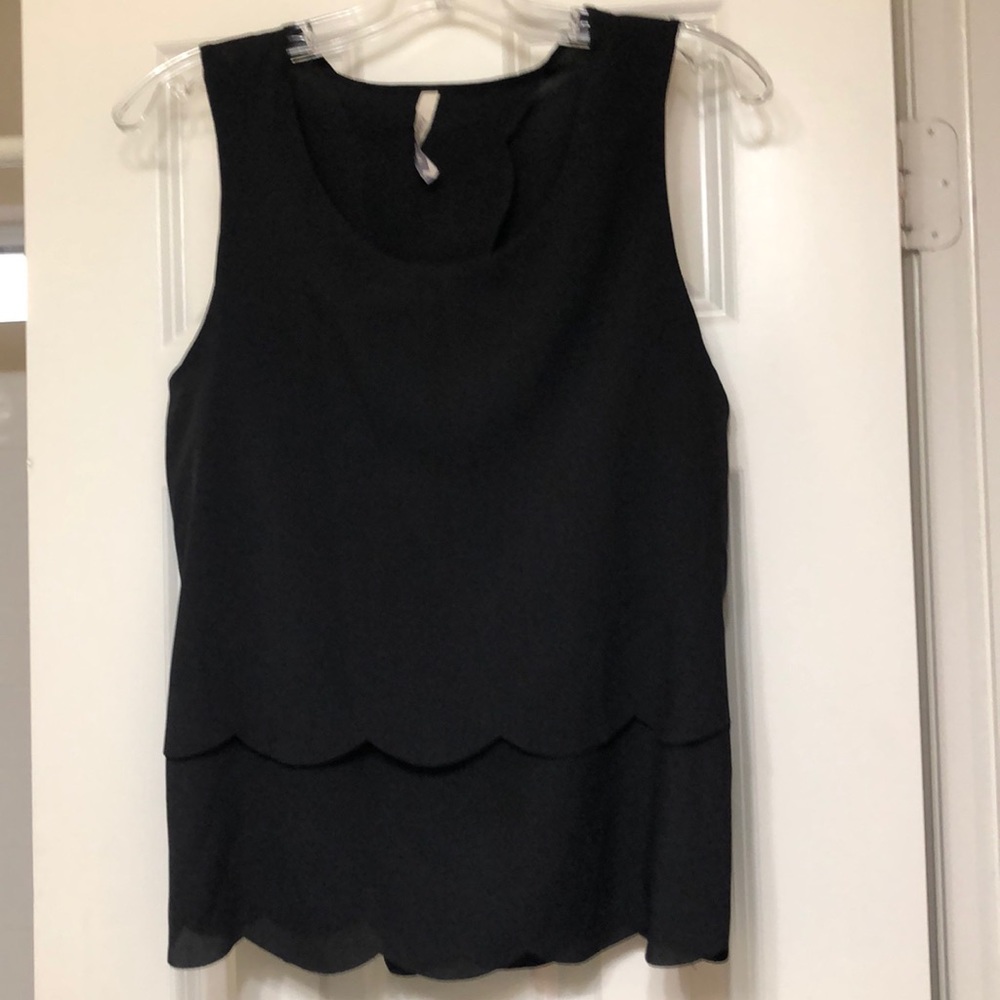 Scalloped tank